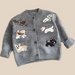 Knitted cardigan with puppy print – soft knit, button fastening | unisex