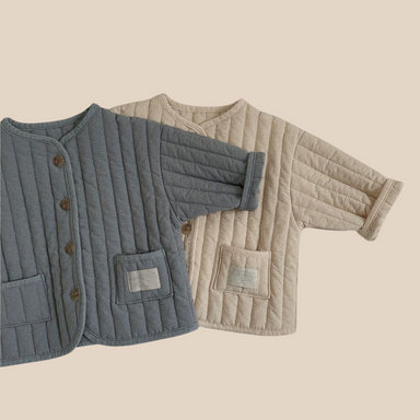 Quilted jacket keeps little ones warm and cosy – soft cotton, button fastening | unisex baby coat