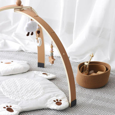 Wooden baby play gym stimulates development – hangers, safe materials | 0+ months