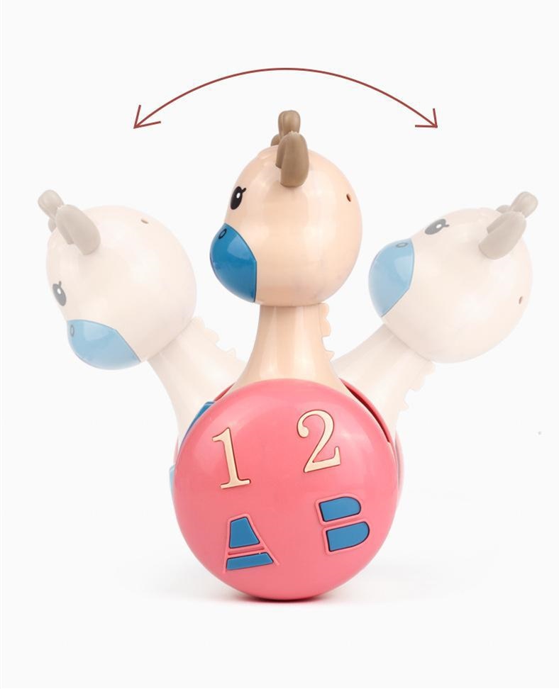 Tumbling toy rolls and plays sounds – self-rights, boosts motor skills | for babies