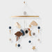 Wooden baby mobile without batteries – natural materials, soft colours | Nursery décor