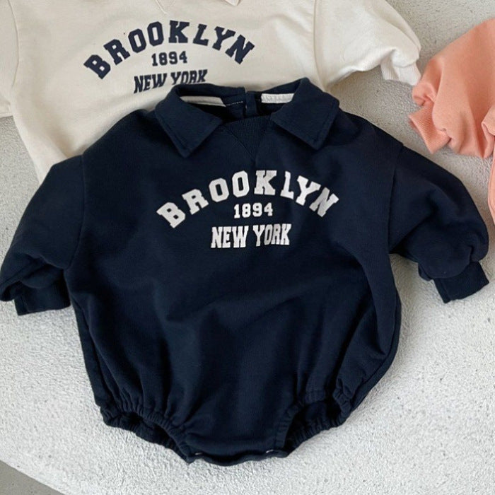 Baby romper with college-style New York print – soft cotton, popper fastening | unisex 0–2 years