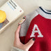 Knitted jumper keeps little ones warm – ribbed cuffs, bird print | boys