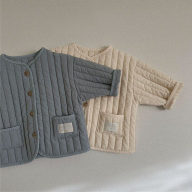 Quilted jacket keeps little ones warm and cosy – soft cotton, button fastening | unisex baby coat