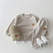 Bear tracksuit keeps kids cosy in soft cotton – elastic waist, easy to wear | kids