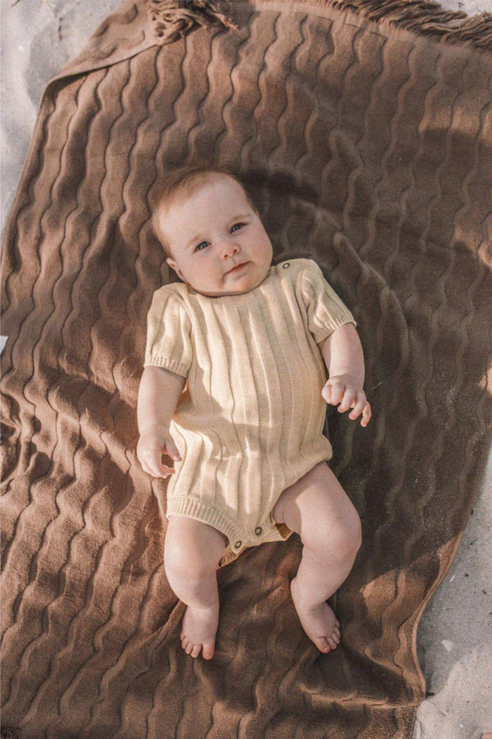 Knitted romper with ribbed design – soft cotton blend, easy popper fastening | Baby clothing
