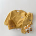 Bear tracksuit keeps kids cosy in soft cotton – elastic waist, easy to wear | kids