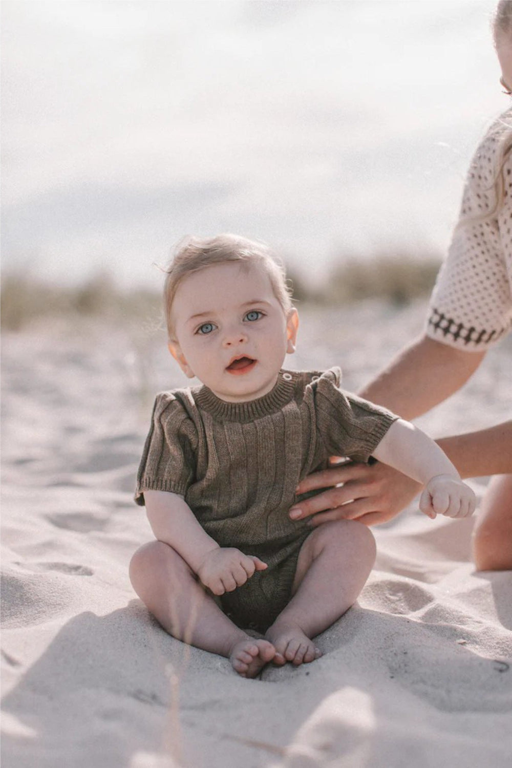 Knitted romper with ribbed design – soft cotton blend, easy popper fastening | Baby clothing