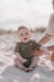 Knitted romper with ribbed design – soft cotton blend, easy popper fastening | Baby clothing