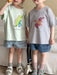 T-shirt with dino print – soft cotton, relaxed fit | for babies and children