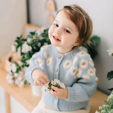 Knitted girls' cardigan with daisy design – soft, buttoned, ribbed cuffs